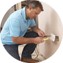Electrician Installing Wall Socket